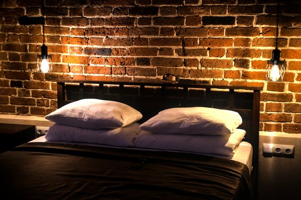 What are the best strategies for incorporating a loft bed in a UK child's narrow bedroom?